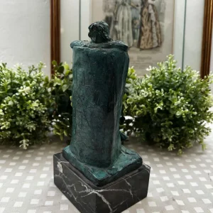 Escultura de bronce
